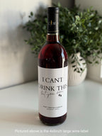 Large 4x5 inch 'I can't drink this' baby announcement label on a red wine bottle