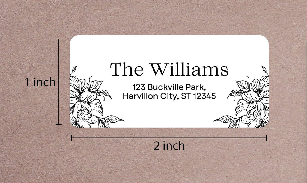 Floral return address label sample shown with 2 x 1 inch size measurements